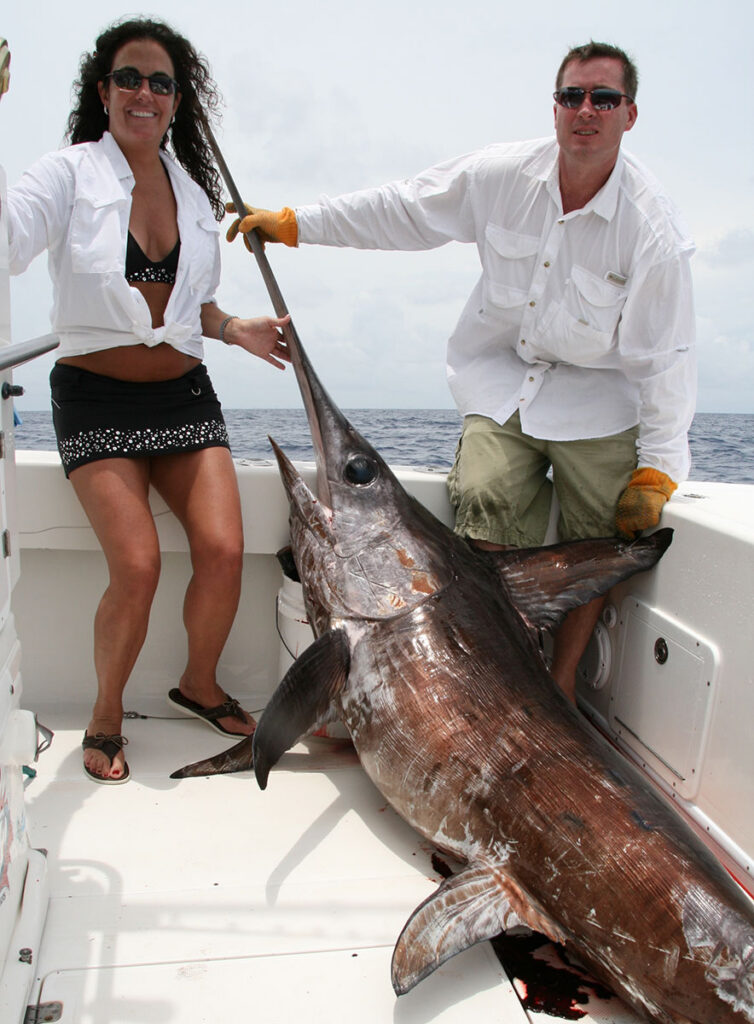 Huge swordfish captured by a husband and wife team.