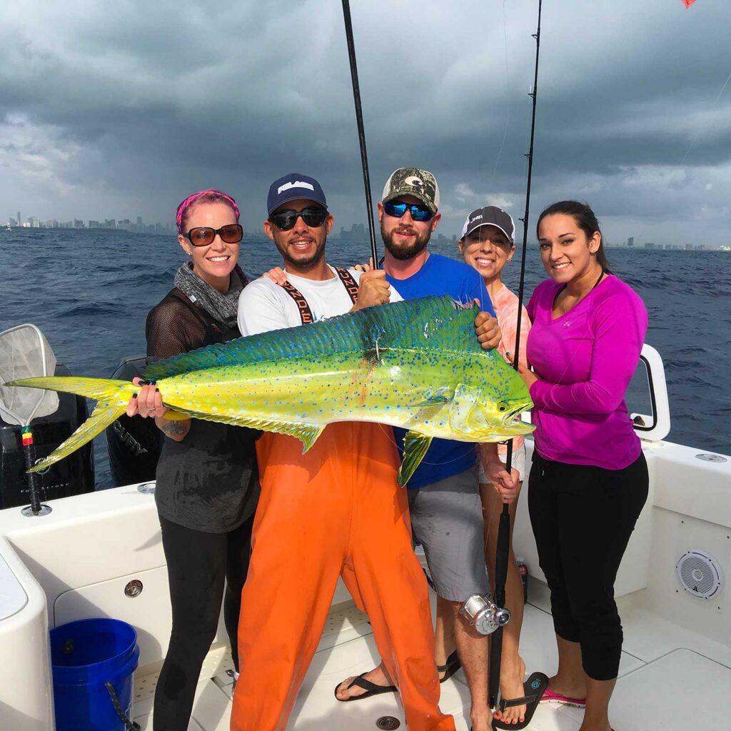 Happy charter party with a nice mahi-mahi.